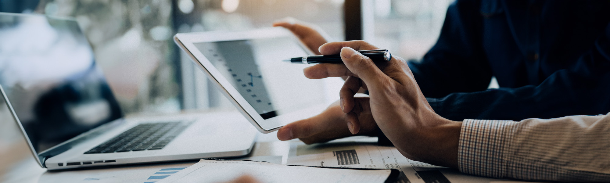 business partnership coworkers using a tablet image
