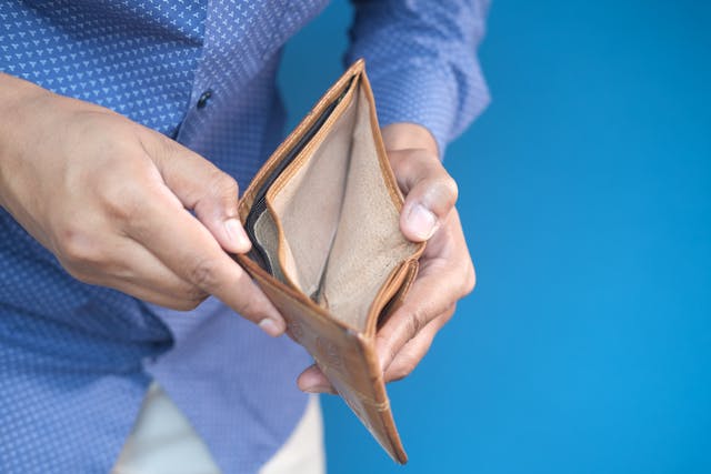 person opening empty wallet