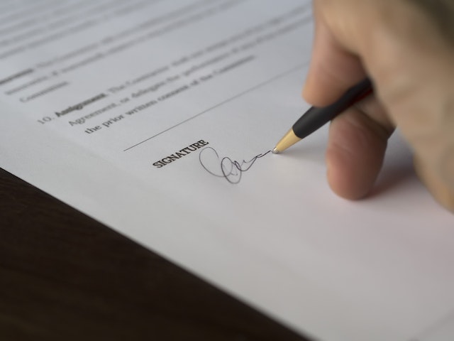 person signing document