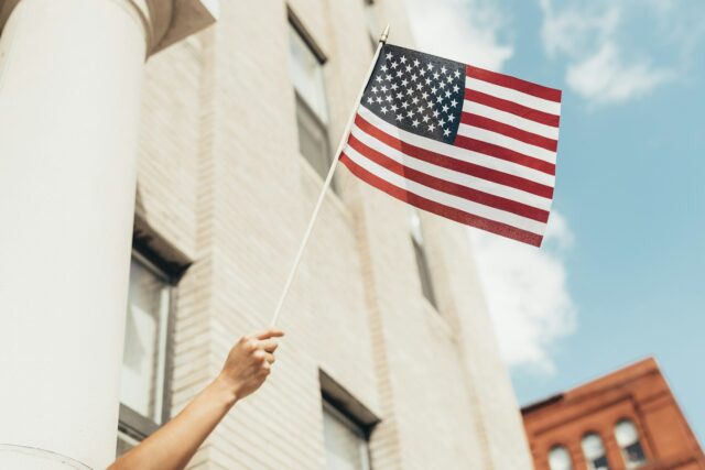 person waving American flag