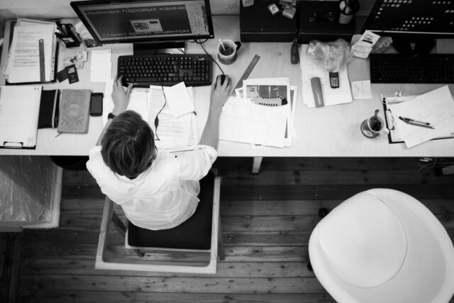 worker sitting at office desk